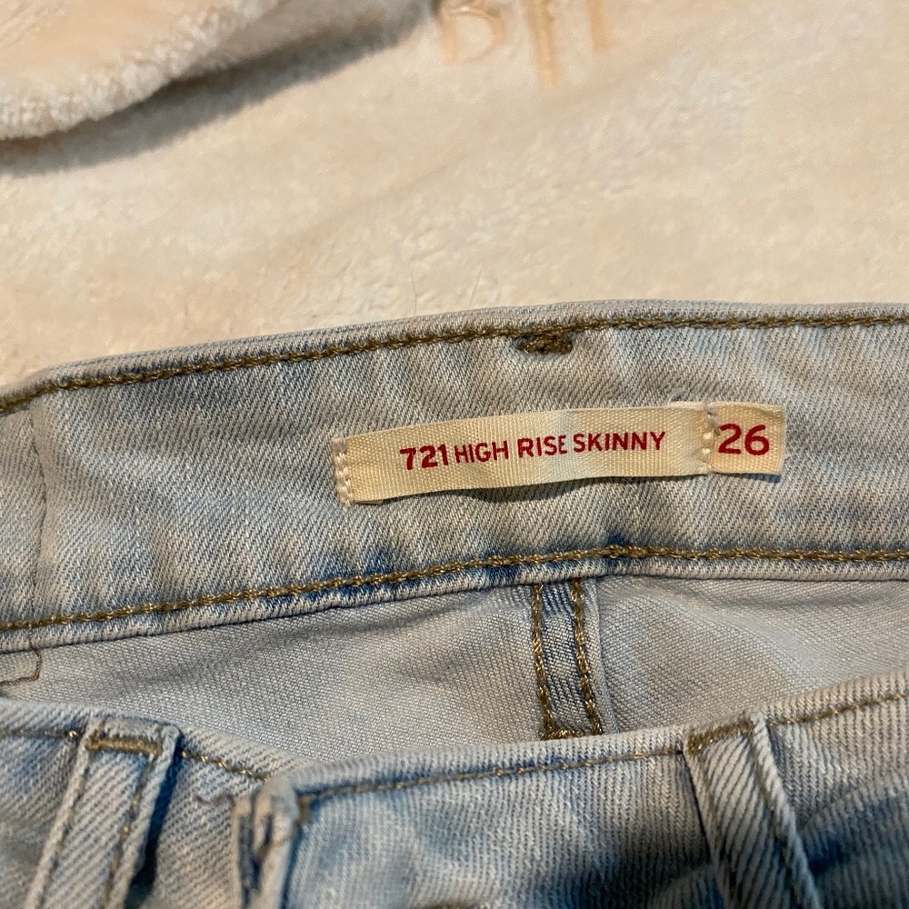 Levis size 26 light wash 721 distressed jeans